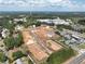Aerial view showcasing the community layout, surrounding trees, and nearby roads at 107 Winsome Way, Woodstock, GA 30188