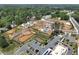 Aerial view of new neighborhood under development, showing homes, streets, and amenities at 107 Winsome Way, Woodstock, GA 30188