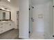 Modern bathroom featuring glass shower and double vanity at 107 Winsome Way, Woodstock, GA 30188