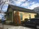 Attractive Century House Tavern exterior with covered front porch and designated handicap parking at 107 Winsome Way, Woodstock, GA 30188
