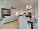 Open concept dining area with a view into the living room and kitchen at 107 Winsome Way, Woodstock, GA 30188