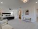 Spacious main bedroom with sitting area and abundant natural light at 107 Winsome Way, Woodstock, GA 30188