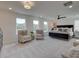 Spacious main bedroom with sitting area and large windows at 107 Winsome Way, Woodstock, GA 30188