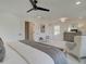 Comfortable main bedroom featuring a ceiling fan and neutral decor at 107 Winsome Way, Woodstock, GA 30188