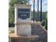 Attractive Winnsome Park brick and stone sign at community entrance at 107 Winsome Way, Woodstock, GA 30188
