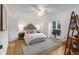 Comfortable bedroom with natural light, area rug and decor shelving at 320 Tuxworth Cir, Decatur, GA 30033