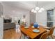 Bright dining room with hardwood floors adjacent to the living room at 320 Tuxworth Cir, Decatur, GA 30033