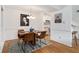 Cozy dining area with hardwood floors open to the kitchen, and living space at 320 Tuxworth Cir, Decatur, GA 30033