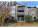 Multi-story building with balconies, showcasing the architecture and outdoor living spaces at 320 Tuxworth Cir, Decatur, GA 30033