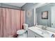 Bathroom with shower/tub combo and vanity at 4646 Biffle Rd, Stone Mountain, GA 30088