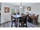 Dining area with a wood table and six chairs at 4646 Biffle Rd, Stone Mountain, GA 30088