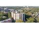 Aerial view of condo building with view to Bobby Jones Golf Course at 1 Biscayne Nw Dr # 809, Atlanta, GA 30309