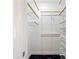 Walk-in closet with custom shelving and storage solutions at 1 Biscayne Nw Dr # 809, Atlanta, GA 30309