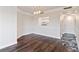 Dining area with hardwood flooring features adjacent views into the kitchen at 1 Biscayne Nw Dr # 809, Atlanta, GA 30309