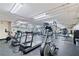 Community gym equipped with treadmills, elliptical machines, and free weights at 1 Biscayne Nw Dr # 809, Atlanta, GA 30309