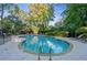 Refreshing outdoor pool area with lounge chairs, surrounded by lush greenery and landscaping at 1 Biscayne Nw Dr # 809, Atlanta, GA 30309