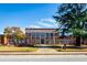 Brick community center with landscaping and flag at 120 Asher Dr, Carrollton, GA 30116