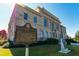 An architectural view of the Charles Carroll building against a blue sky and lush, green lawn at 120 Asher Dr, Carrollton, GA 30116