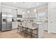 Modern kitchen featuring stainless steel appliances and an island with barstool seating at 120 Asher Dr, Carrollton, GA 30116