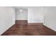 Spacious living room has new paint and dark hardwood floors at 204 Natchez Trce, Sandy Springs, GA 30350