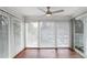 Cozy sunroom featuring a ceiling fan and sliding glass doors at 204 Natchez Trce, Sandy Springs, GA 30350