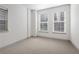 Bright bedroom with plush carpet and neutral paint color at 607 Broadview Ter, Atlanta, GA 30324