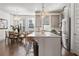 Spacious kitchen with stainless steel appliances, eat-in island, and a dining nook at 607 Broadview Ter, Atlanta, GA 30324