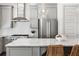 Close-up of kitchen featuring stainless steel appliances and a large kitchen island at 607 Broadview Ter, Atlanta, GA 30324