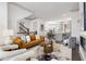 Open floor plan showcasing living room with fireplace, kitchen with island, and staircase at 607 Broadview Ter, Atlanta, GA 30324