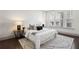 Bright main bedroom with stylish rug, lamps, and decorative pillows at 607 Broadview Ter, Atlanta, GA 30324