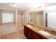 Bathroom features double sinks, granite countertops, and a separate tub and shower at 3301 Cascade Parc Blvd, Atlanta, GA 30311