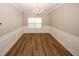 Formal dining room with hardwood floors and wainscoting at 3301 Cascade Parc Blvd, Atlanta, GA 30311