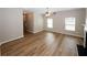 Spacious living room with hardwood floors and a ceiling fan at 3301 Cascade Parc Blvd, Atlanta, GA 30311