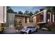 Stunning modern home featuring a sleek design, beautiful landscaping, and a luxurious sports car at 3939 Ivy Rd, Atlanta, GA 30342