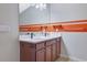 Bathroom featuring double sinks, vanity and a large mirror at 55 Burns View Ct, Lawrenceville, GA 30044