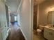 Convenient half bathroom with shower and vanity at 140 Birch Tree Way, Cumming, GA 30040