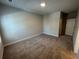Spacious bedroom with neutral walls and plush carpeting at 140 Birch Tree Way, Cumming, GA 30040