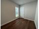 Bright bedroom with hardwood floors and neutral walls at 140 Birch Tree Way, Cumming, GA 30040