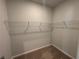 Walk-in closet with wire shelving for storage at 140 Birch Tree Way, Cumming, GA 30040