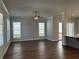 Spacious living room with hardwood floors and lots of natural light at 140 Birch Tree Way, Cumming, GA 30040
