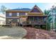 Two-story home with a screened-in porch and deck at 2240 Palmour Ct, Atlanta, GA 30337