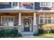 Charming home exterior features a stone facade and covered porch at 2240 Palmour Ct, Atlanta, GA 30337