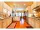 Traditional style kitchen with warm wood cabinetry, granite countertops, and stainless steel appliances at 2240 Palmour Ct, Atlanta, GA 30337