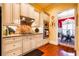 Well-equipped kitchen with custom cabinets, granite countertops, and a tile backsplash plus stainless steel appliances at 2240 Palmour Ct, Atlanta, GA 30337
