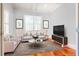 Bright living room with modern decor, comfortable seating and a flat screen television at 2240 Palmour Ct, Atlanta, GA 30337