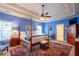 Large main bedroom features trey ceilings, neutral paint, a four-poster bed and a decorative area rug at 2240 Palmour Ct, Atlanta, GA 30337