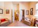 Cozy sitting area with two armchairs, hardwood floors, and easy access to the kitchen and bathroom at 2240 Palmour Ct, Atlanta, GA 30337