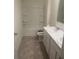 Clean bathroom with double vanity, bathtub, and shower at 266 Broder Farms Dr, Stockbridge, GA 30281