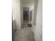 Bathroom with tile floors and access to a large closet at 266 Broder Farms Dr, Stockbridge, GA 30281