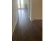 Dark hardwood floors in a bright hallway at 266 Broder Farms Dr, Stockbridge, GA 30281